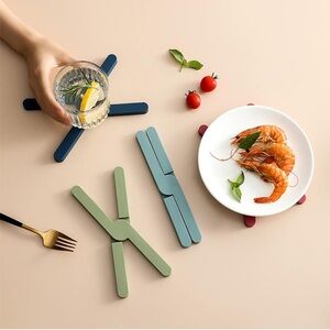 NIB (3) silicone folding trivet pot holders, heat resistant